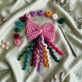Handmade Pink Crochet Hair Bow with Colorful Spirals